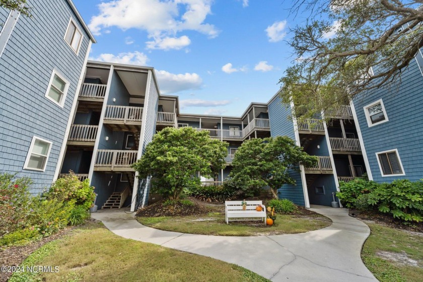 Discover coastal living at its finest in this stunning - Beach Condo for sale in North Topsail Beach, North Carolina on Beachhouse.com