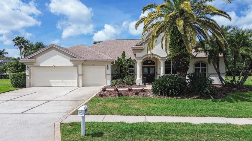 EXQUISITE, MOVE-IN READY Arthur Rutenburg Home, nestled in - Beach Home for sale in Palm Harbor, Florida on Beachhouse.com