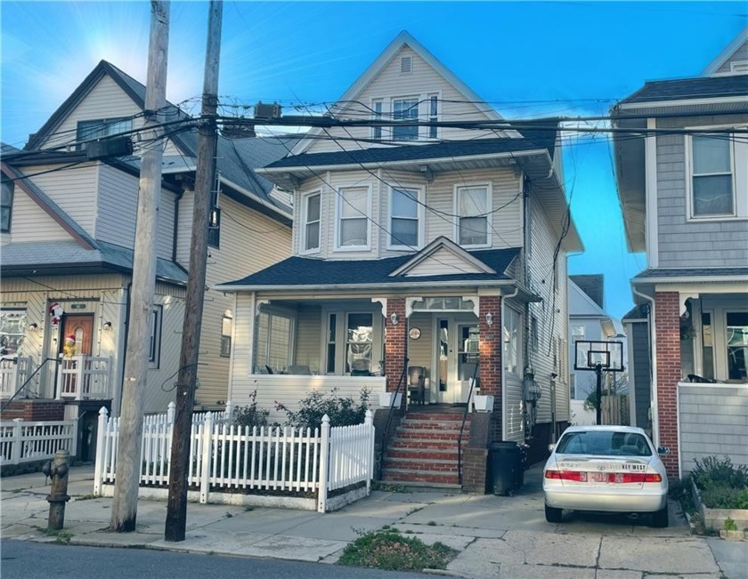 This charming 3 family home is loaded with potential. Perfect - Beach Home for sale in Rockaway Park, New York on Beachhouse.com