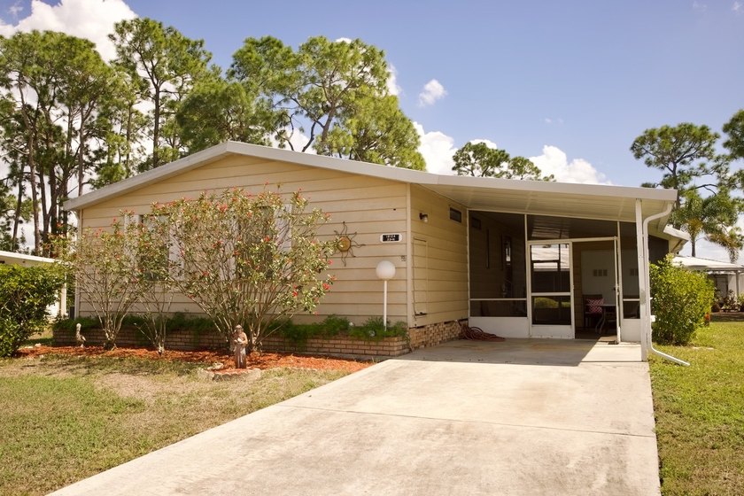 This lovely, 2/2 manufactured home on leased land in Lake - Beach Home for sale in North Fort Myers, Florida on Beachhouse.com