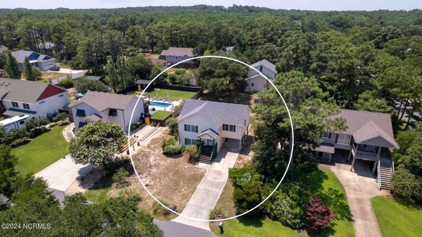 Welcome to this enchanting beach home nestled on an expansive 11 - Beach Home for sale in Kill Devil Hills, North Carolina on Beachhouse.com