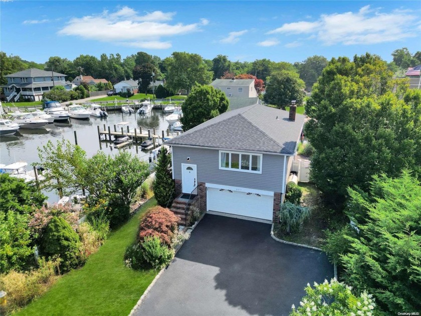 Discover the epitome of waterfront living in this newly - Beach Home for sale in Islip, New York on Beachhouse.com