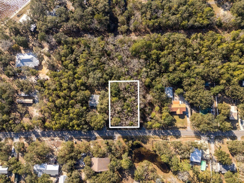 Discover the perfect spot to build your dream home! This level - Beach Lot for sale in Freeport, Florida on Beachhouse.com