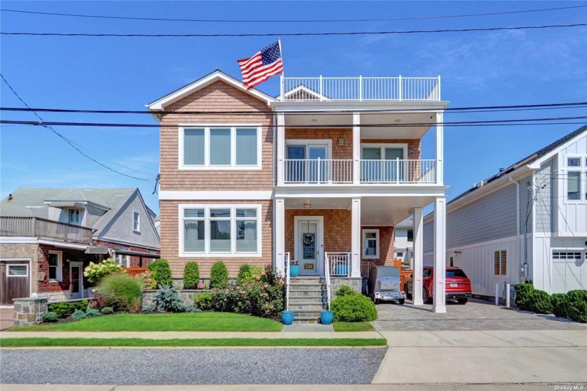 *WATCH FULL VIRTUAL TOUR* Discover the epitome of coastal luxury - Beach Home for sale in Point Lookout, New York on Beachhouse.com