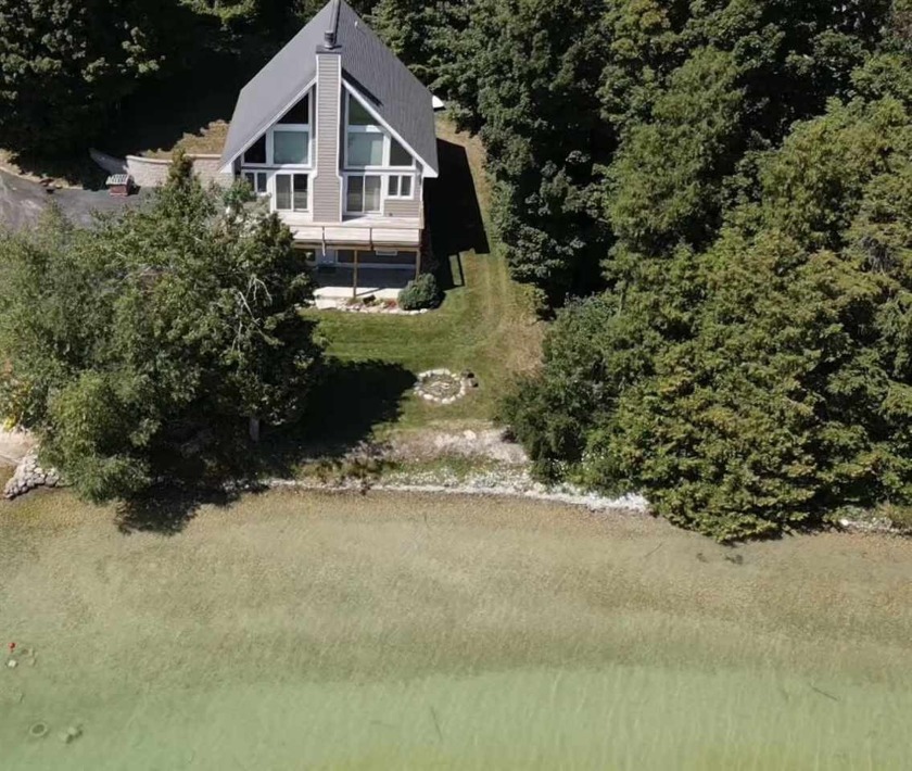 Built in 2005, this beautifully kept and meticulously maintained - Beach Home for sale in Leland, Michigan on Beachhouse.com