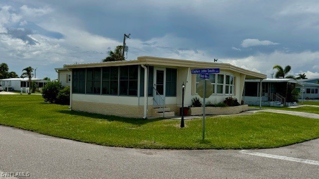 This charming single family home boasts 2 bedrooms, 2 bathrooms - Beach Home for sale in North Fort Myers, Florida on Beachhouse.com