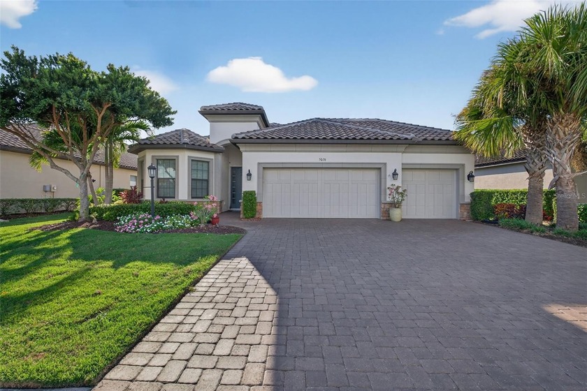 A rare Lazio floorplan with golf and a full 3-car garage on an - Beach Home for sale in Bradenton, Florida on Beachhouse.com