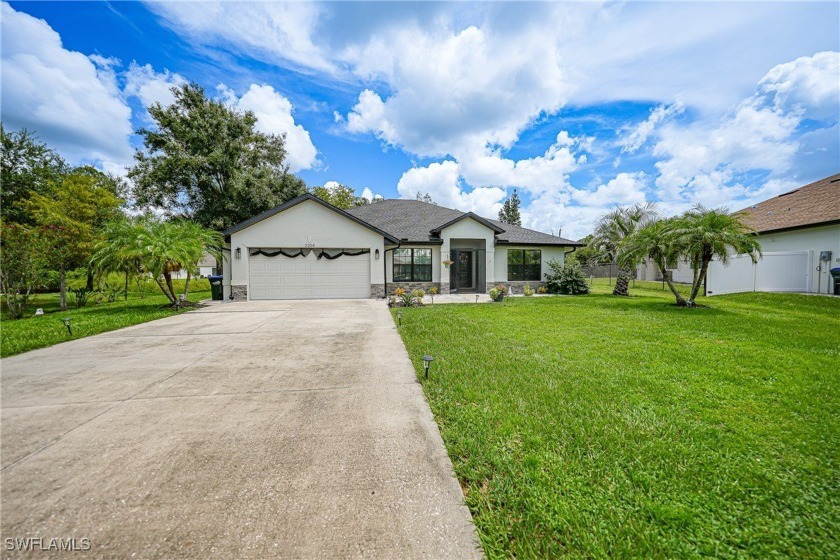 PRICE IMPROVEMENT! Nestled on an oversized corner lot, and - Beach Home for sale in North Port, Florida on Beachhouse.com