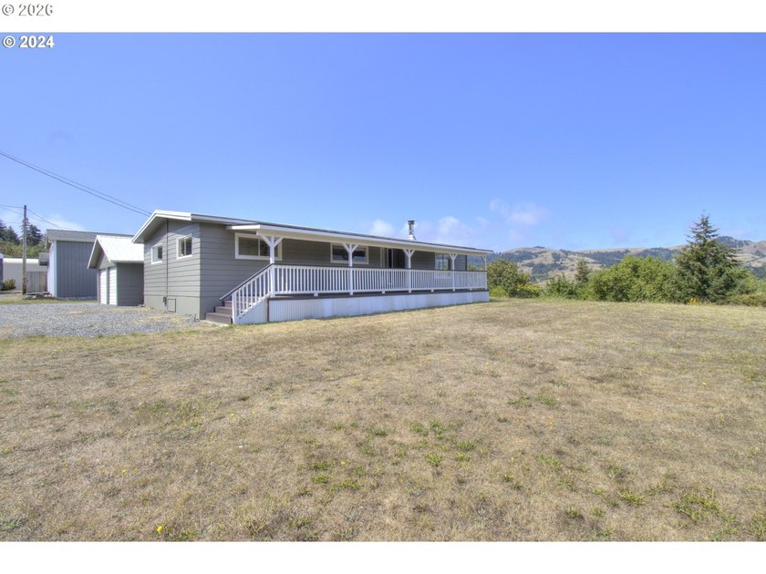 Enjoy peaceful up-river living in this 2 bedroom, 2 bath home - Beach Home for sale in Gold Beach, Oregon on Beachhouse.com