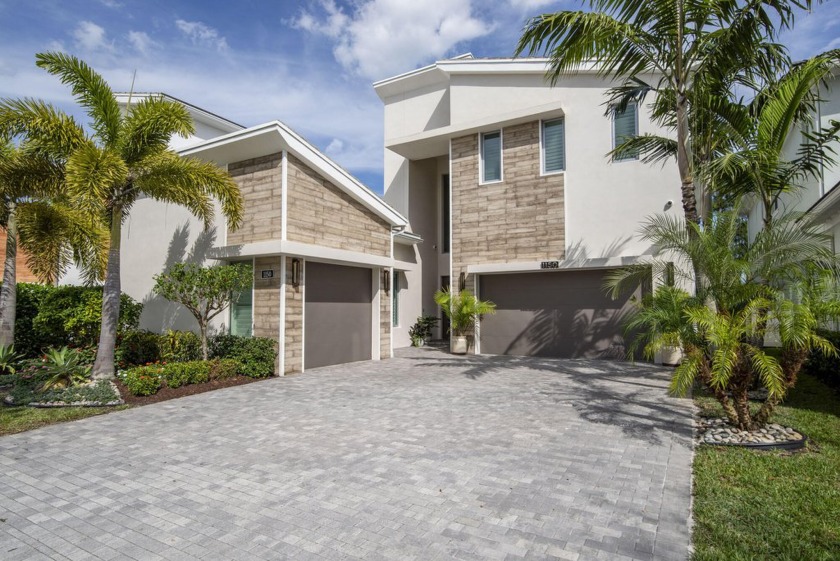 This ONE-OF-A-KIND immaculate, move-in-ready pool home defines - Beach Home for sale in Palm Beach Gardens, Florida on Beachhouse.com