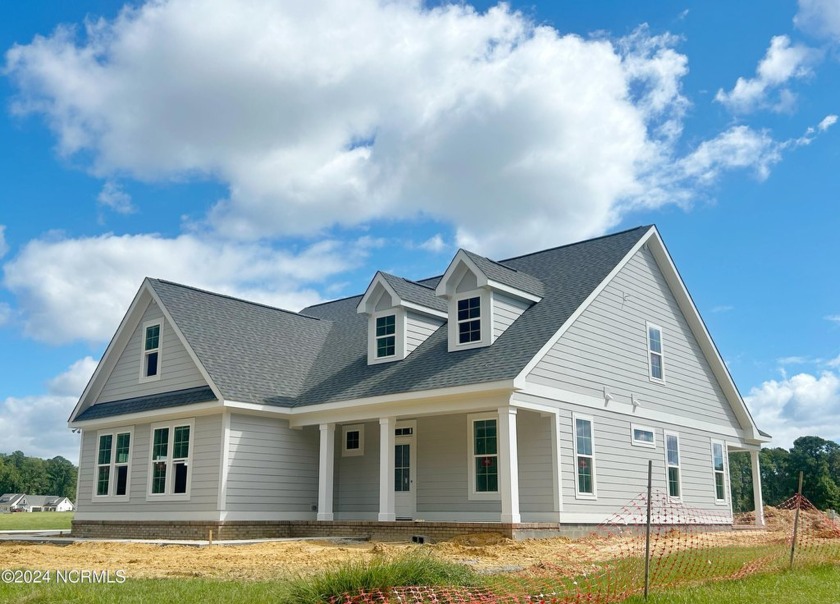 The Mainsail home is perched on a large corner homesite that is - Beach Home for sale in Minnesott Beach, North Carolina on Beachhouse.com