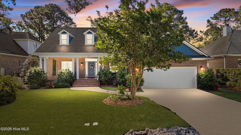 Positioned along the 5th hole in Porters Neck Country Club, this - Beach Home for sale in Wilmington, North Carolina on Beachhouse.com