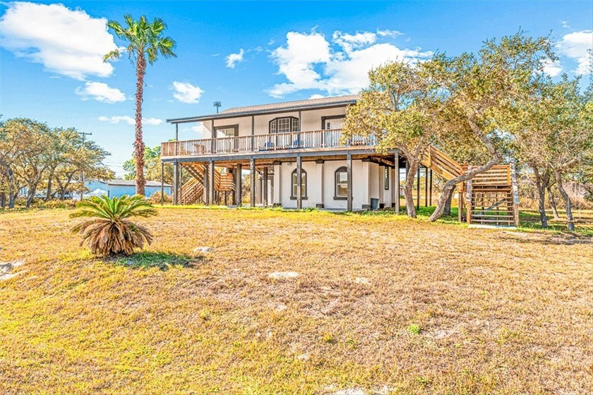 Versatile, recently renovated two-story stucco home offering two - Beach Home for sale in Rockport, Texas on Beachhouse.com