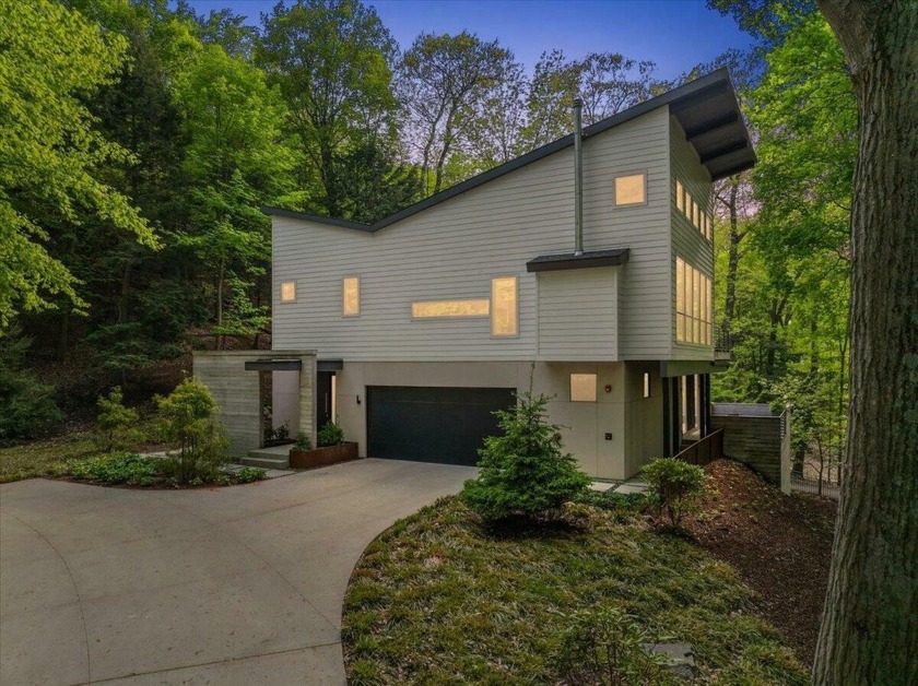 Nestled in the exclusive lakefront enclave of Dunegrass, this - Beach Home for sale in Saugatuck, Michigan on Beachhouse.com
