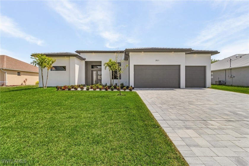 Welcome to a stunning modern masterpiece! This luxurious - Beach Home for sale in Cape Coral, Florida on Beachhouse.com