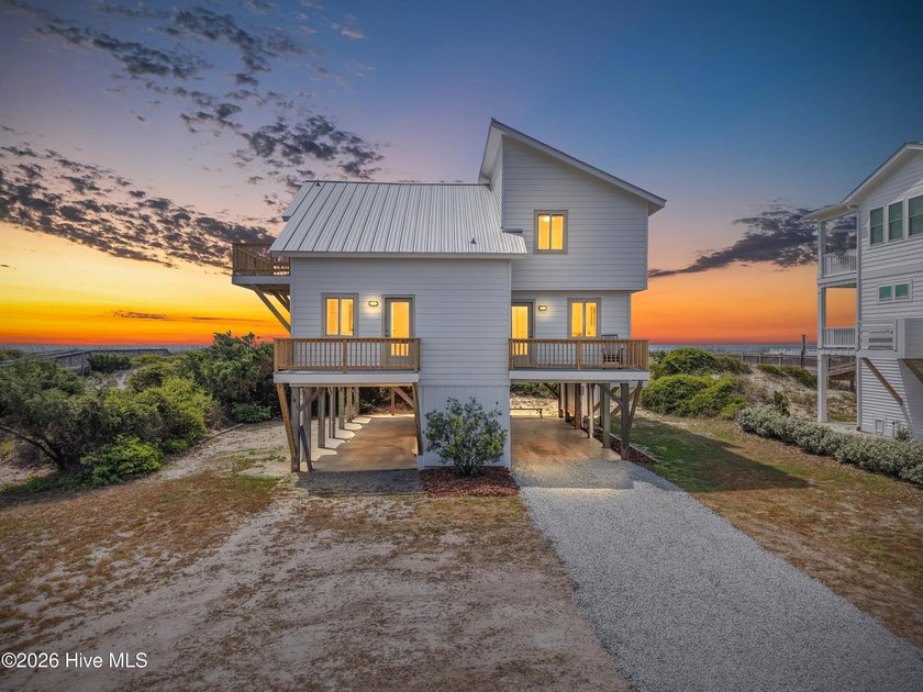 The soft swish and sway of sea oats atop the dune as you sit in - Beach Home for sale in Oak Island, North Carolina on Beachhouse.com