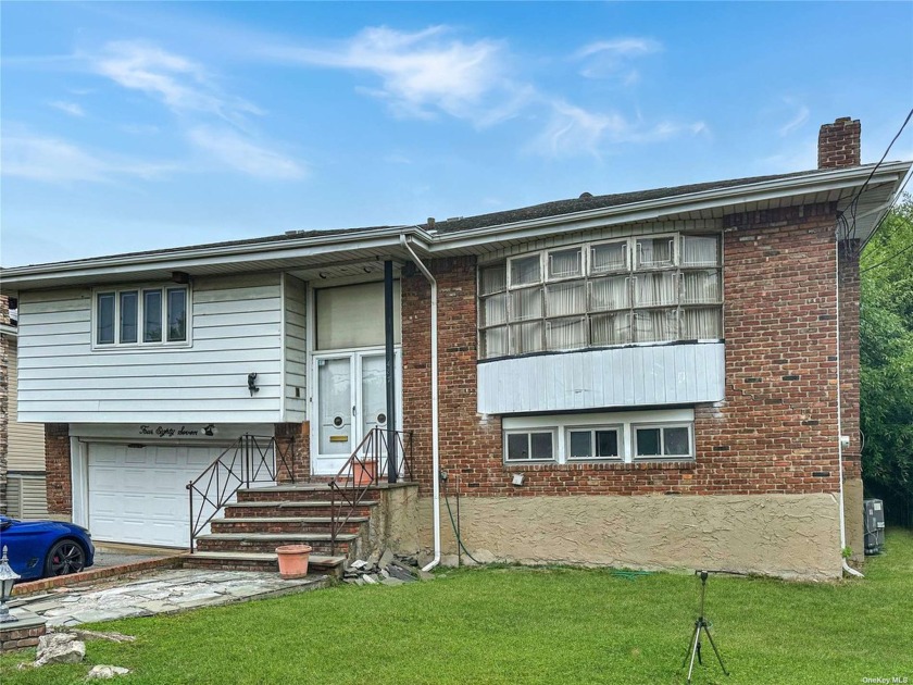 HOMES NEEDS FULL UPDATING. LOWER LEVEL IS FRAMED SINCE 2012 - Beach Home for sale in Oceanside, New York on Beachhouse.com