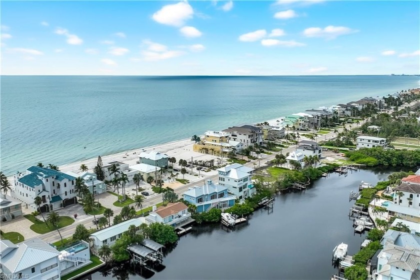 Steps from the white sand beaches and your backyard boat dock - Beach Home for sale in Bonita Springs, Florida on Beachhouse.com