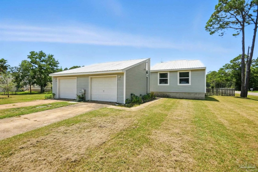 Waterfront under $300K! This 2-bedroom, 2-bath duplex with 1,312 - Beach Home for sale in Milton, Florida on Beachhouse.com