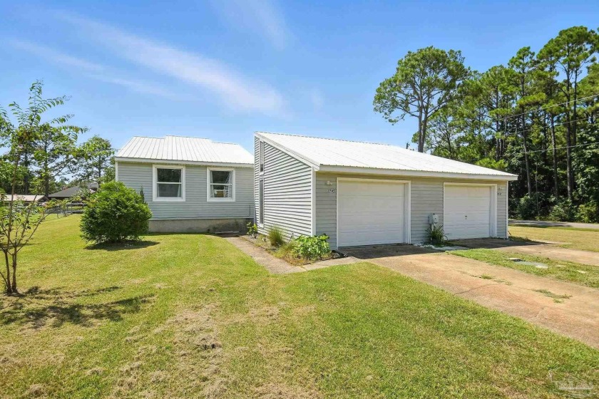 Waterfront under $300K! This 2-bedroom, 2-bath duplex with 1,312 - Beach Home for sale in Milton, Florida on Beachhouse.com