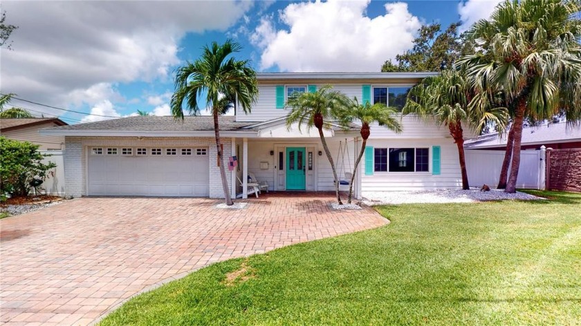 Come see this waterfront paradise!  4 bedroom, 2 1/2 bath, 2 car - Beach Home for sale in St. Petersburg, Florida on Beachhouse.com