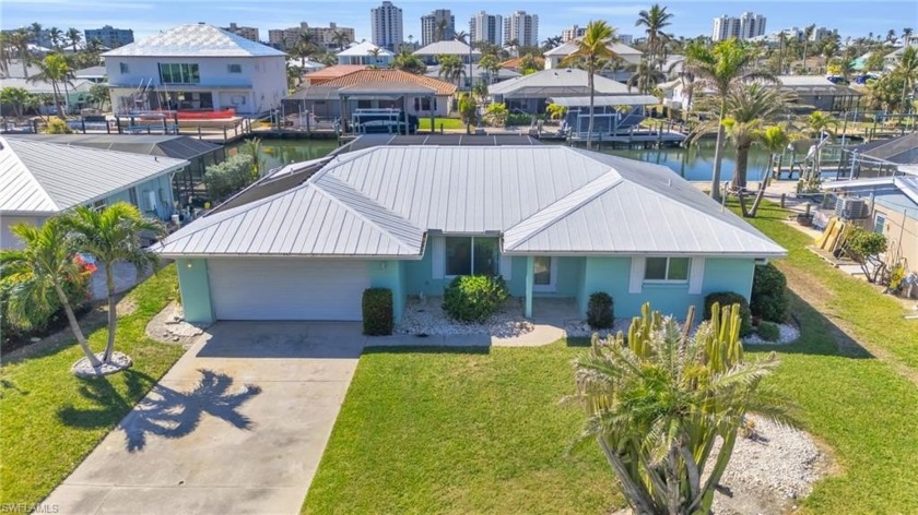 Stunning Coastal Canal Home with Pool and Spa located in the - Beach Home for sale in Fort Myers Beach, Florida on Beachhouse.com