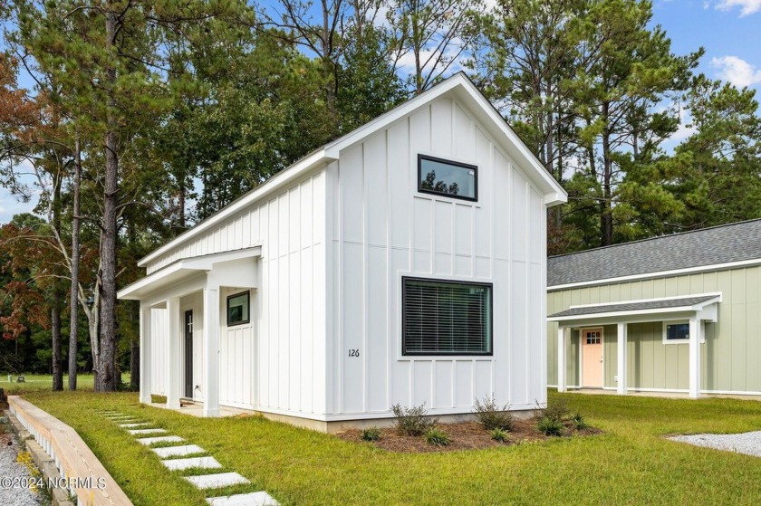 Discover Coastal Elegance at The Cabins at Old Horse a new small - Beach Condo for sale in Stella, North Carolina on Beachhouse.com