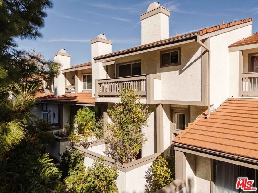 Nestled in the sought-after Palisades Highlands, this townhome - Beach Condo for sale in Pacific Palisades, California on Beachhouse.com