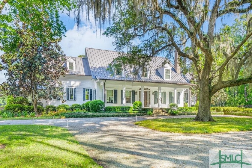 Gorgeous estate situated on the mouth of Lake Sterling in The - Beach Home for sale in Richmond Hill, Georgia on Beachhouse.com