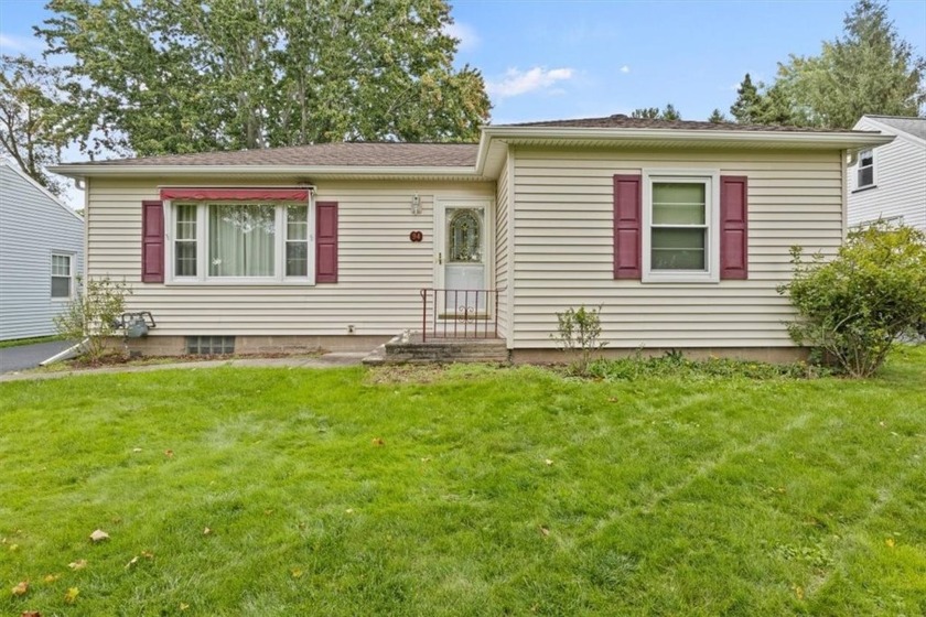 Welcome to this meticulously maintained 3-bedroom, 1.1-bath - Beach Home for sale in Irondequoit, New York on Beachhouse.com