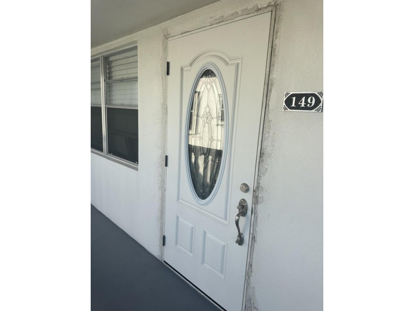 BEAUTIFUL 1 BEDROOM 2 BATH, CORNER UNIT, SECOND FLOOR, NEW FRONT - Beach Condo for sale in West Palm Beach, Florida on Beachhouse.com