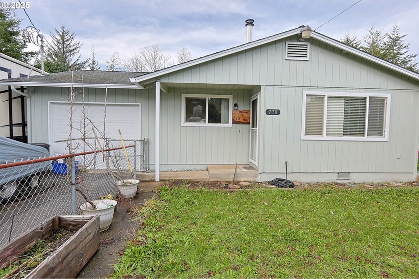 Tucked at the end of a dead-end street, this charming 3-bedroom - Beach Home for sale in Coos Bay, Oregon on Beachhouse.com