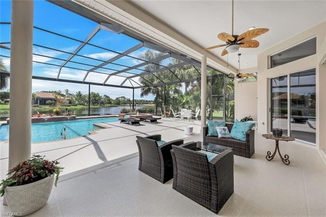 From the moment you enter this lake side home you are greeted - Beach Home for sale in Estero, Florida on Beachhouse.com