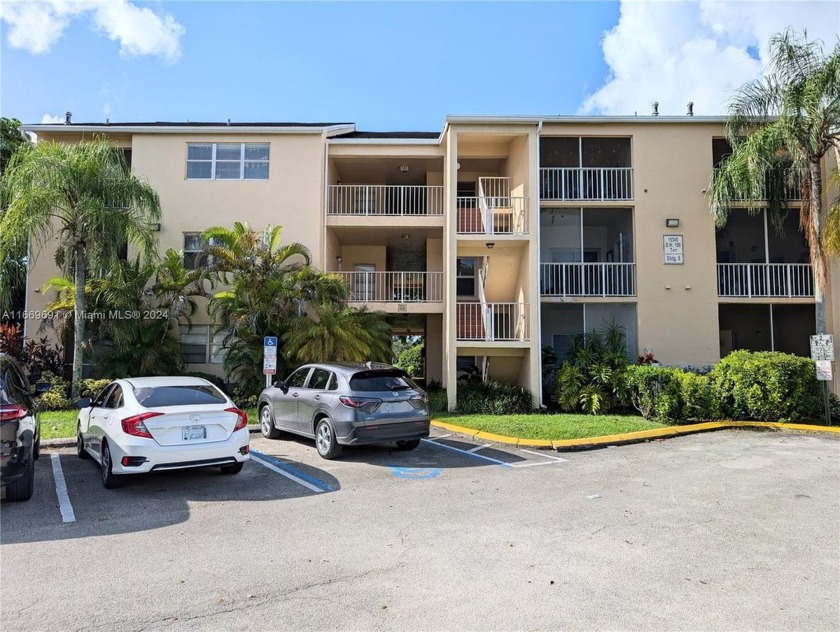 Discover this delightful 2-bedroom, 1st-floor corner unit - Beach Condo for sale in Miami, Florida on Beachhouse.com