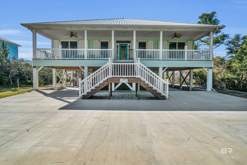 Have you ever envisioned owning a beach house that combines the - Beach Home for sale in Gulf Shores, Alabama on Beachhouse.com