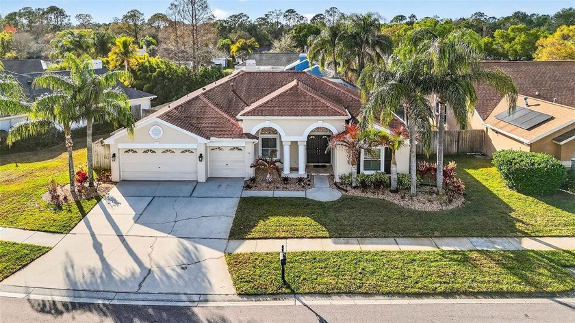 Price Improvement in Westchase, this heated saltwater pool home - Beach Home for sale in Tampa, Florida on Beachhouse.com