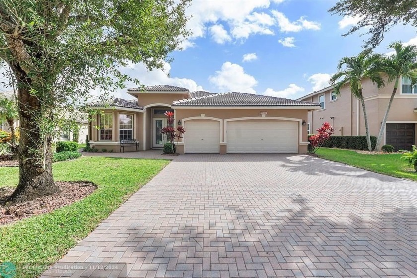 Welcome to this exquisite single-family home in prestigious - Beach Home for sale in Coral Springs, Florida on Beachhouse.com