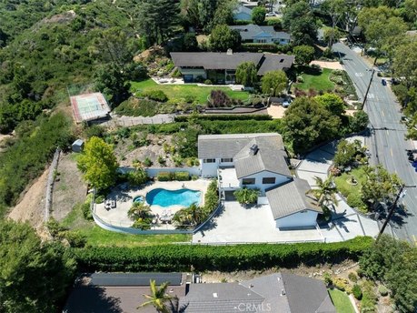 Nestled on a beautifully landscaped .85-acre lot, this - Beach Home for sale in Palos Verdes Peninsula, California on Beachhouse.com