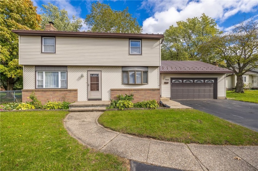 Welcome to this delightful 3-bedroom, 2.5-bath colonial - Beach Home for sale in Irondequoit, New York on Beachhouse.com