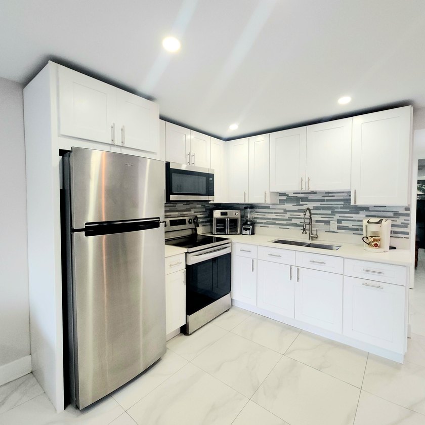 Spectacular renovated 1st floor condo in the active 55 community - Beach Condo for sale in West Palm Beach, Florida on Beachhouse.com