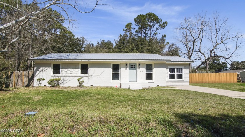 This beautifully remodeled 3-bedroom, 2-bathroom home with a - Beach Home for sale in Apalachicola, Florida on Beachhouse.com