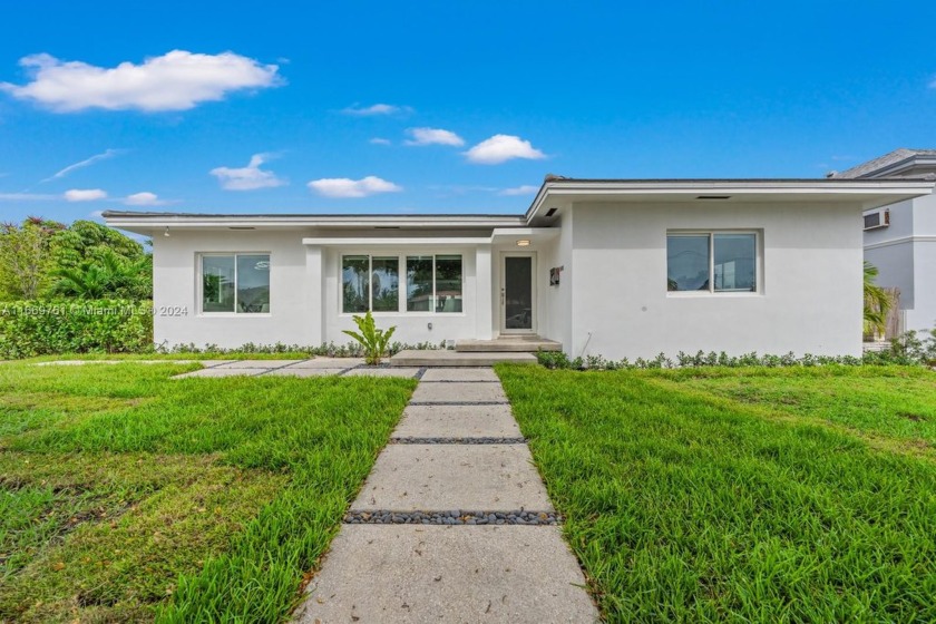 This stunning 4-bedroom, 4-bathroom single-family home in the - Beach Home for sale in Miami Beach, Florida on Beachhouse.com