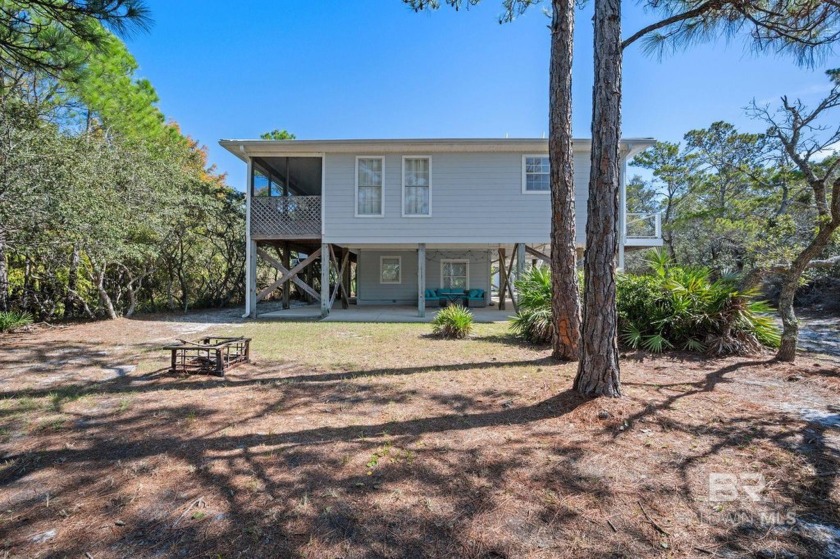 Escape to this 4 bedroom 2.5 bathroom home located in a serene - Beach Home for sale in Gulf Shores, Alabama on Beachhouse.com