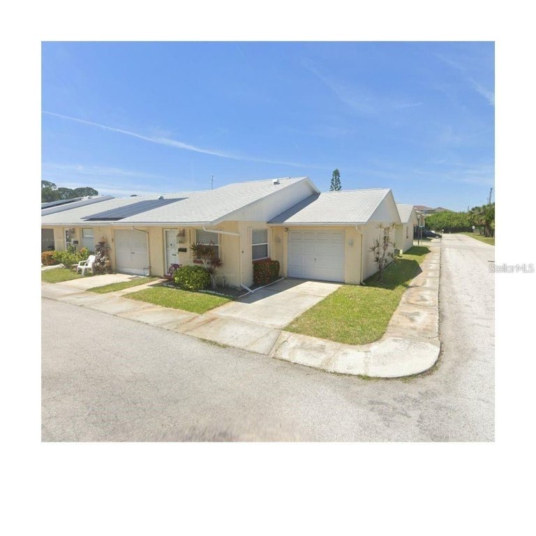 Highly desirable end unit - the largest model in the complex!
 - Beach Condo for sale in New Port Richey, Florida on Beachhouse.com