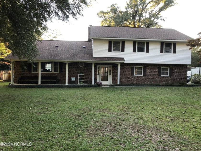 GOLF COURSE Lot on side at the 5th Green. This Spacious home has - Beach Home for sale in River Bend, North Carolina on Beachhouse.com