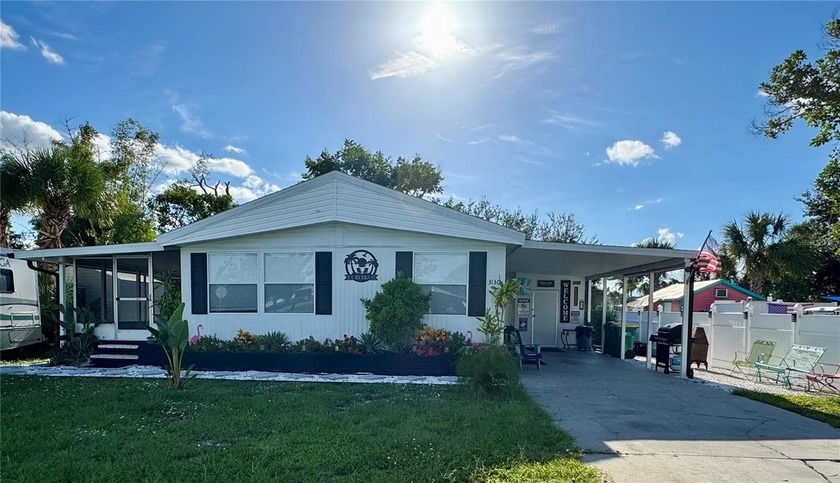 Coastal Charm Awaits! Turn-Key Mobile Home on Owned Land - - Beach Home for sale in Englewood, Florida on Beachhouse.com