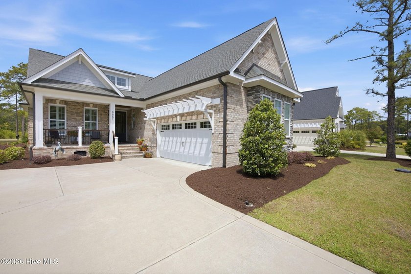 Welcome to this beautifully crafted home where brick and stone - Beach Home for sale in Ocean Isle Beach, North Carolina on Beachhouse.com