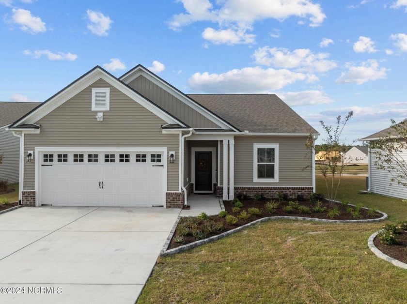 Move-in ready, this stunning home offers an open floor plan with - Beach Home for sale in Calabash, North Carolina on Beachhouse.com