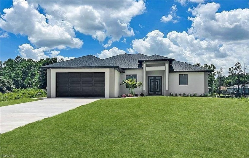 NEW CONSTRUCTION - New CBS construction featuring a split open - Beach Home for sale in Lehigh Acres, Florida on Beachhouse.com