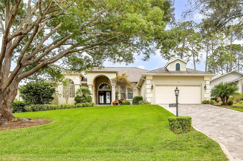 This beautifully appointed 3-bedroom, 3-bath oasis perfectly - Beach Home for sale in Spring Hill, Florida on Beachhouse.com